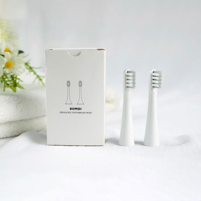 Bomidi TX5-2 Tête de brosse à dents électrique Brosse à dents souple (2 pièces de brosse à tête de rechange) Tête de brosse à poils souples longue durée Compatible avec la brosse à dents électrique TX5 - Blanc